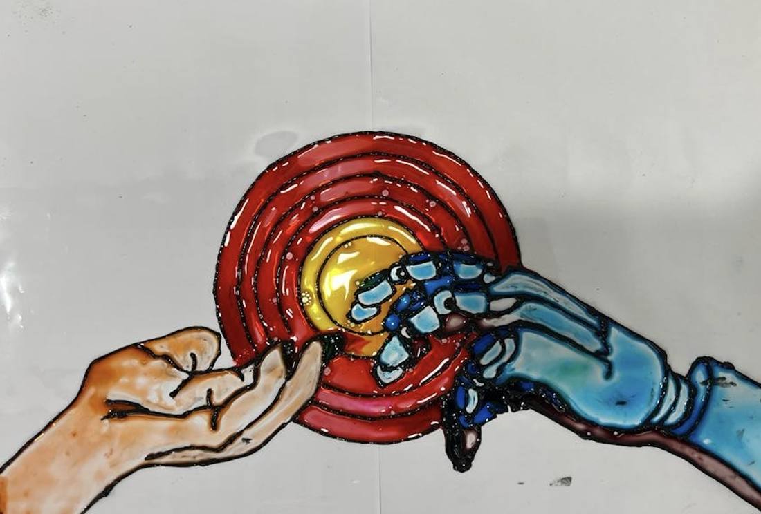 Glass paint artwork of two reaching hands